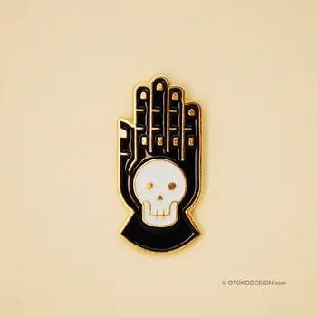

Badge metal black hand with white skull (52601)