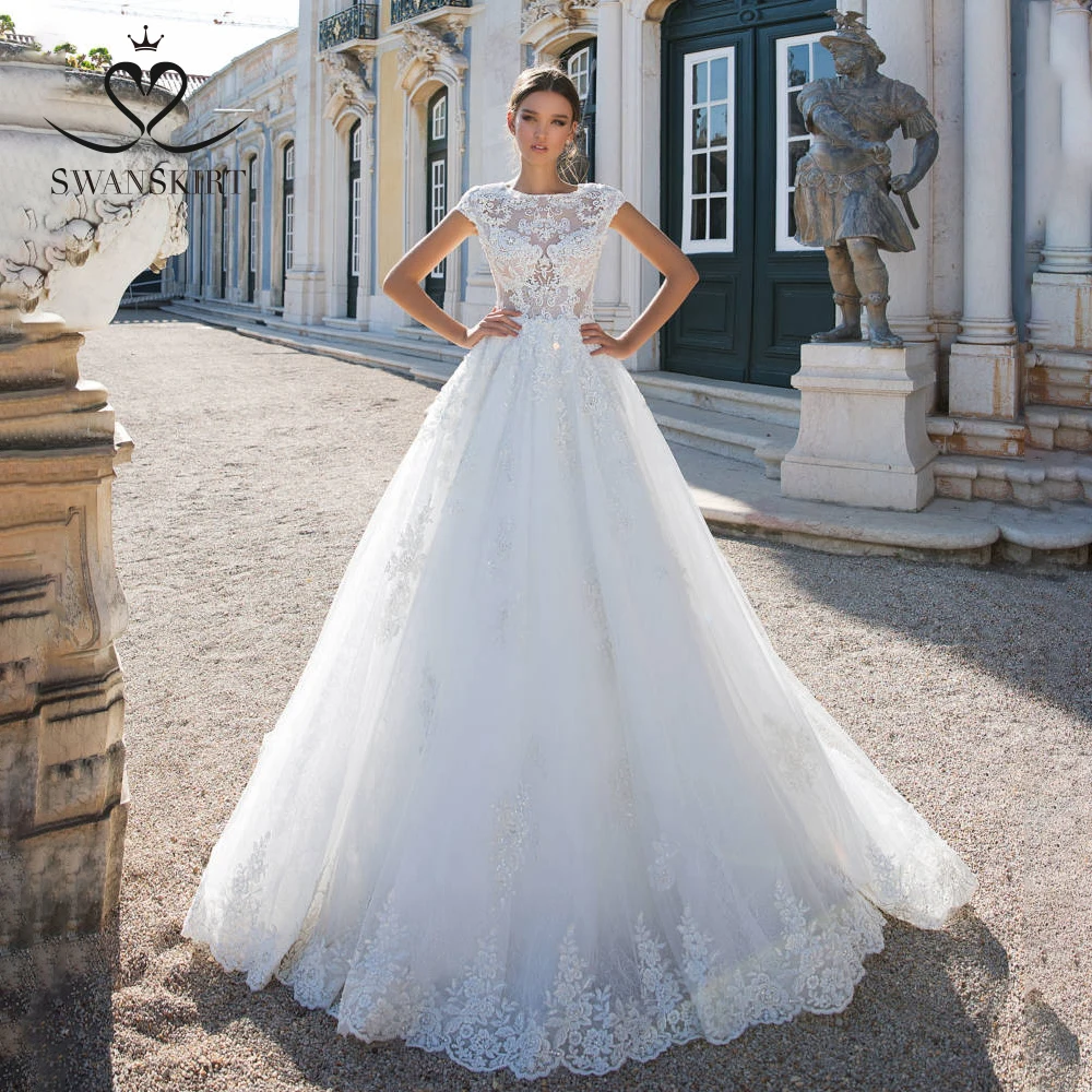 

Vintage Princess Wedding Dress 2019 Swanskirt Appliques Lace A-Line Beaded Court Train Bride Gown Illusion Robe de mariee I181