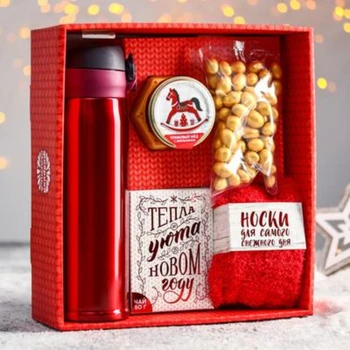

Gift Set "heat and comfort", "Happy New Year", a wonderful year." Thermos, tea, cream-honey, warm socks, peanuts in glaze.