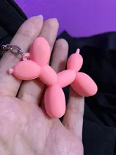 Nuevo creativo de dibujos animados globo de Llavero perro colgante anillo de hombres y mujeres par bolsa de llavero colgante venta al por mayor