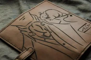 

Leather wallet with laser mouse drawing