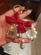2020 nuevo de imitación de la perla botella de Perfume con llavero coche Soporte para Llavero bolsa encanto colgante accesorios arco clave Cadena de llavero