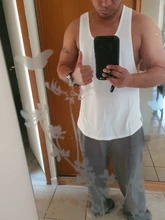 Marca de ropa de gimnasio de algodón camisetas canotte culturismo stringer tank top fitness camiseta chicos musculosos chaleco camiseta sin mangas