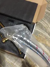 Grifo giratorio de cocina de oro Latón de lujo moderno, grifo extraíble para fregadero, con una sola manija afilada, agua fría y caliente de un solo orificio