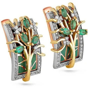 

Kabarovsky earrings with emeralds and diamonds in red gold