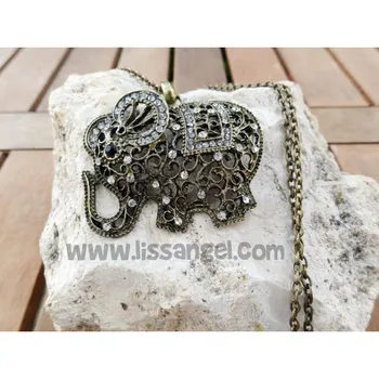 

Elephant pendant with bright stones