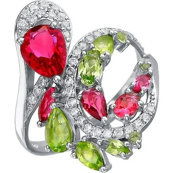 

Jewelry Tradition ring with хризолитами, рубеллитами and cubic zirconia Silver