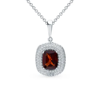 

Silver Pendant with cubic zirconia and Garnet sunlight