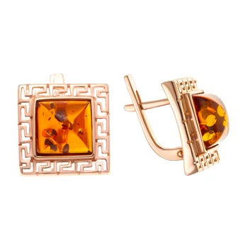 

Earrings made of silver with Amber cognac