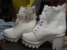 Invierno nuevo patrón de tacón alto talón grueso botas frenillo impermeable de fondo grueso gran código blanco botas de mujer YYJ250