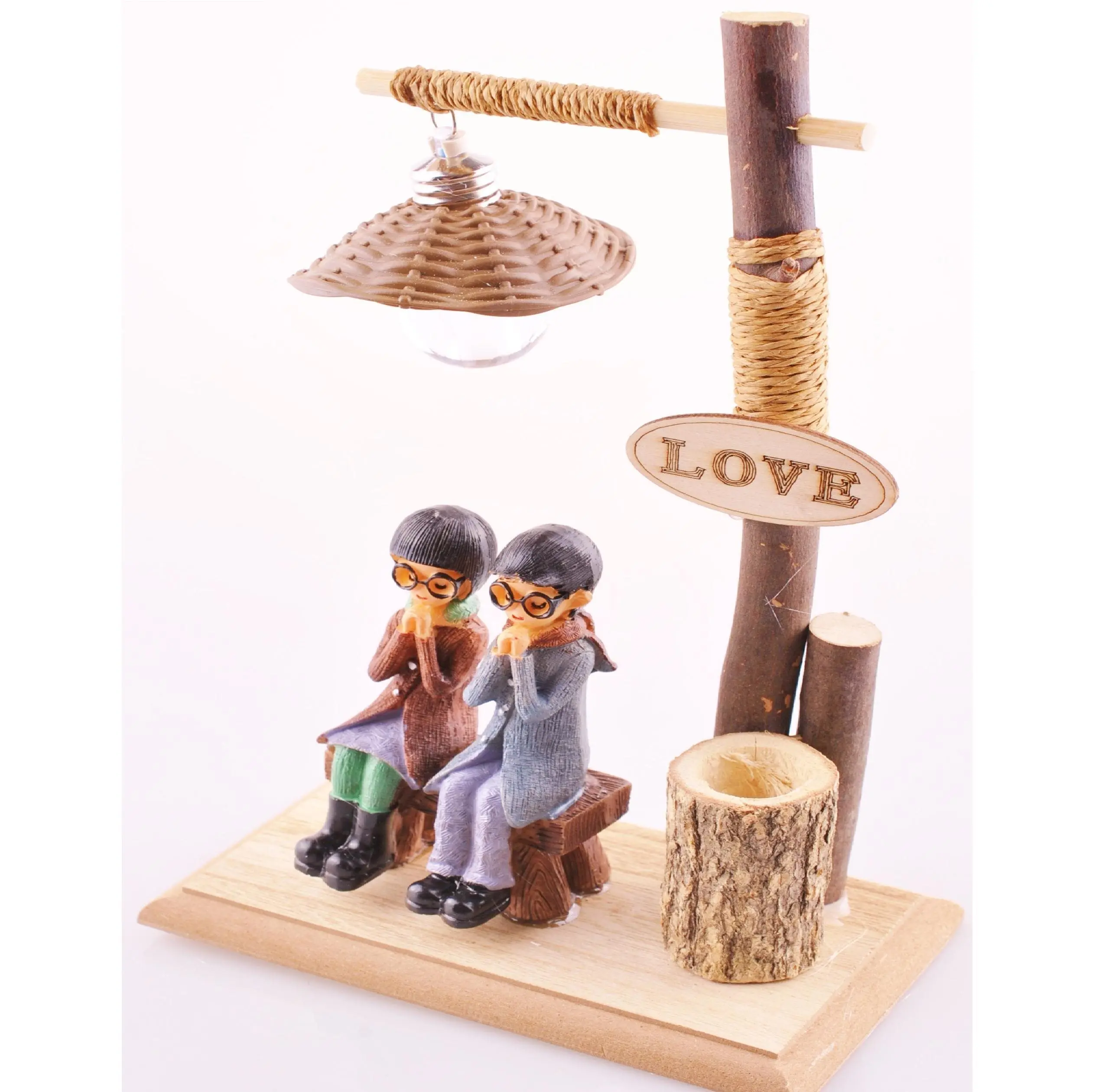 

Themed Romantic Lovers sitting on the bench and illuminated of wooden pen holder Trinkets