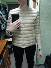 Abrigo de plumón ultraligero para mujer, chaqueta de plumón de pato sin cuello redondo, acolchado, portátil, novedad de invierno 2020