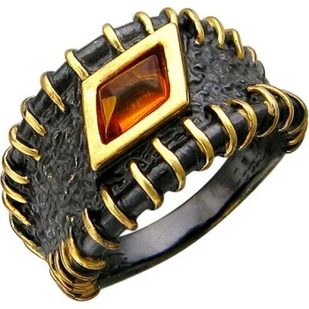 

Esthete ring with Amber made of black silver with gilding