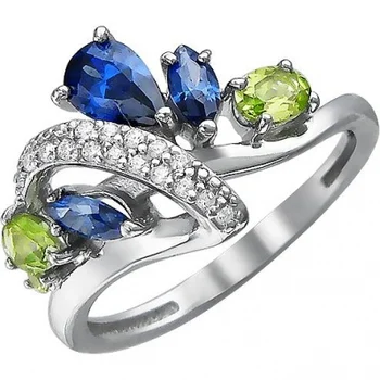 

Jewelry Tradition ring with хризолитами, tanzanites and cubic zirconia