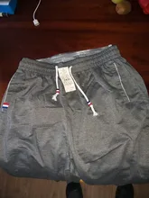 Pantalones de chándal de talla grande tamaño de los hombres pista corredores pantalones de cintura elástica deporte Casual pantalones holgados gimnasio ropa negro gris