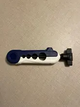 Carrete enrollador de línea de pesca portátil, 1 uds, carrete de carrete giratorio y Baitcasting, sistema de estación de pesca