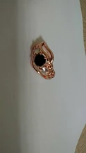 Huitan-Anillo de bruja para mujer, piedra negra única, ajuste giratorio, Diseño de banda, Color oro rosa, anillos de dedo de compromiso para mujer, venta al por mayor