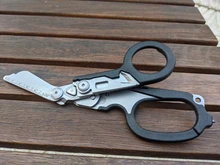 Tijeras de Respuesta de Emergencia Raptor 6 en 1, con cortador de Correa y interruptor de vidrio negro con funda Compatible con MOLLE