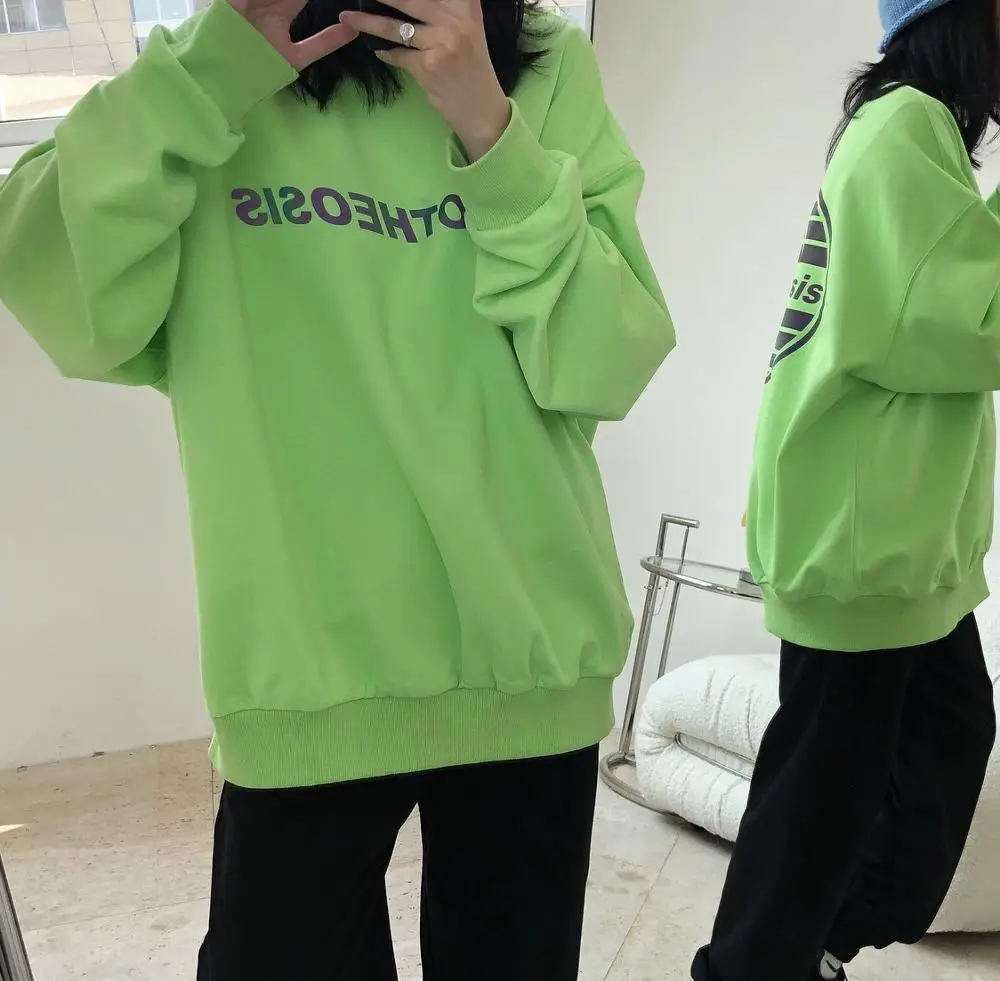 

woman sweatshirt with reflective letters
