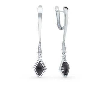 

Silver earrings with cubic zirconia and jewelry glasses sunlight sample 925