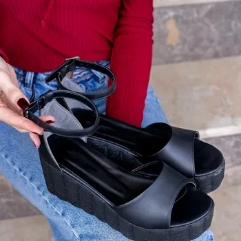 

Linai Black Skin Wedges Sandals