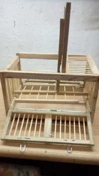

Wooden trap cage with a side door