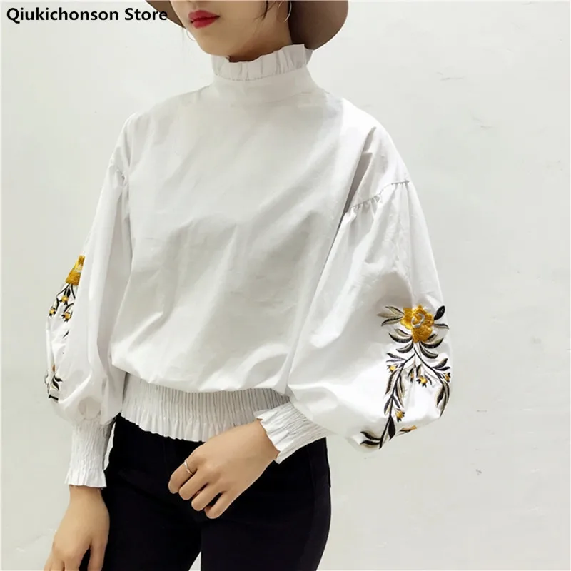 

Qiukichonson White Black Spring Lantern Sleeve Blouse Women 2022 Korean Casual Ruffles Stand Collar Embroidery Blouses Crop Tops