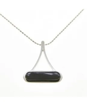 

Silver and jet pendant.
