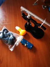 16 Uds herramienta de prensa de reloj con pilas para reloj Kit de herramientas de repuesto y troqueles de ajuste para reloj herramienta de retirada de Parte posterior reparación y Batte más cercano