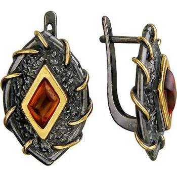 

Esthete earrings with Amber from black silver with gilding