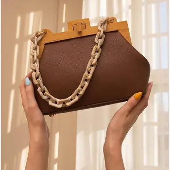

Bag with wooden clasp