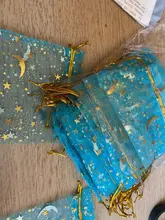 Bolsa de gasa de 50 Uds., bolsas negras de estrellas y luna de 9*12cm, paquete de organza de diseño especial, regalo de boda bronceado, paquete de joyería de dulces