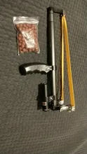 Catapulta tirachinas de alta precisión, barra recta telescópica de alta potencia, láser rojo, banda de goma plana de acero inoxidable para caza al aire libre