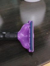 De acero inoxidable de perro mascota peine de limpieza cepillo para quitar el pelo de gato peines de aseo herramienta mango suave mascotas proveedor de accesorios