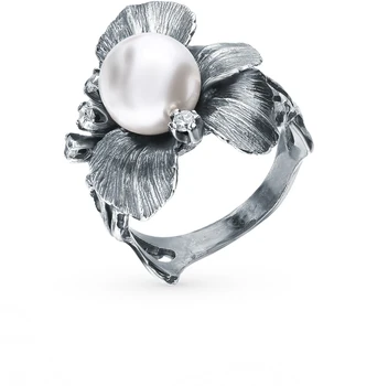 

Silver ring with cubic zirconia and pearls sunlight sample 925 test