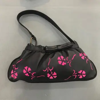 

VICTORIO & LUCCHINO with dies made handbag for Woman de piel de flower