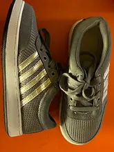 Zapatos de seguridad de cuero para hombre y mujer, botas de trabajo a prueba de perforaciones y golpes, zapatos protectores ligeros, suela de goma para exteriores