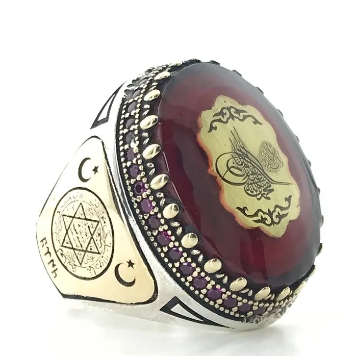 Янтарное и рубиновое серебряное мужское кольцо на заказ