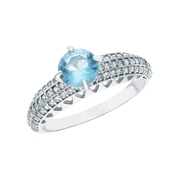 

Silver ring with cubic zirconia and Topaz imitation sunlight sample 925