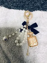 2020 nuevo de imitación de la perla botella de Perfume con llavero coche Soporte para Llavero bolsa encanto colgante accesorios arco clave Cadena de llavero