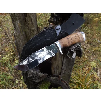 

Knife cutting fangs with a blade of forged steel x12mf with a handle of Merced and birch bark.