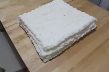 

Handmade children's blanket cream colored