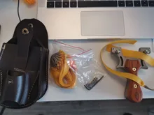 Tirachinas de acero inoxidable para caza potente, honda de cuero plano y madera maciza de alta precisión para exteriores y competición