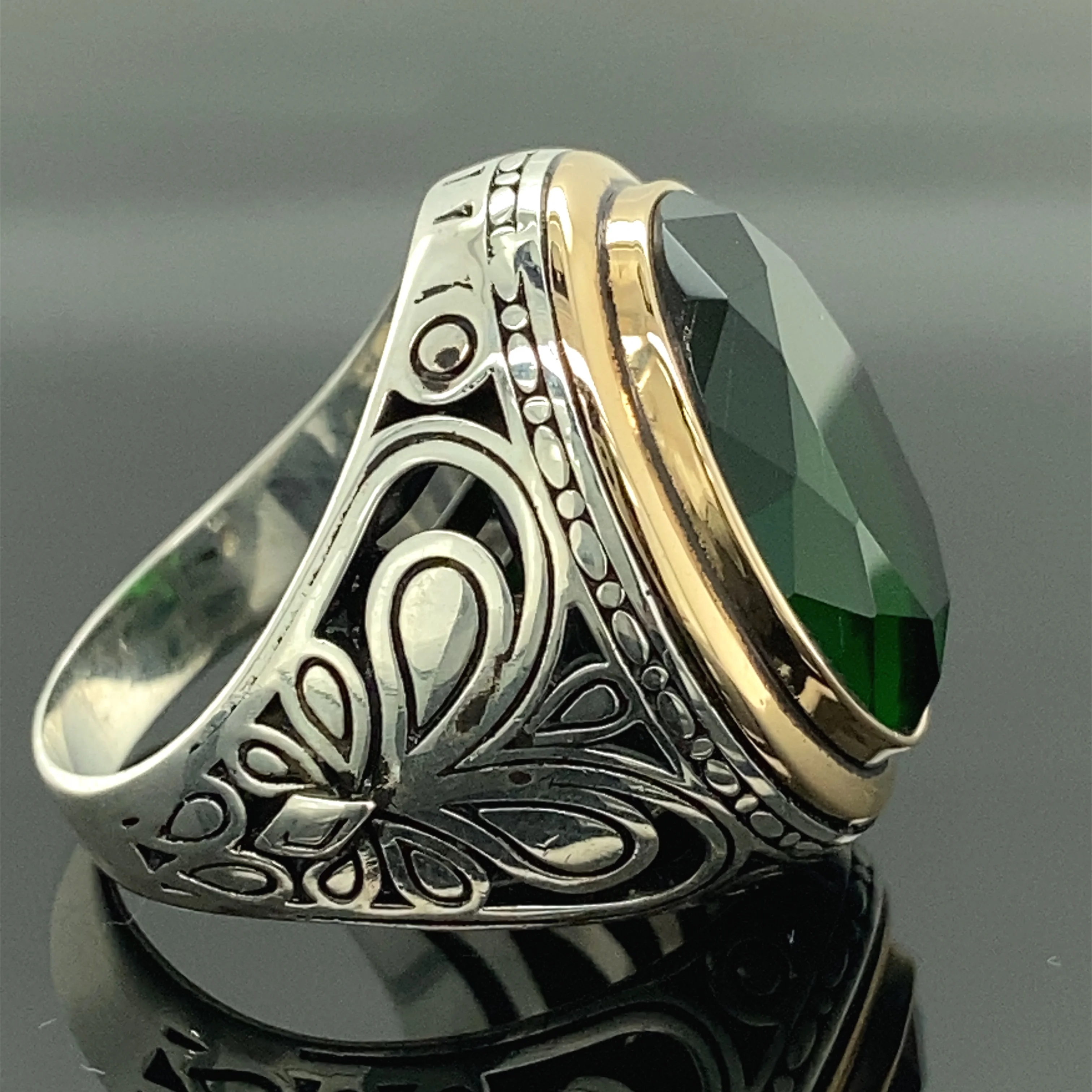 Buy 92.5 Sterling Silver Ring Studded With A Emerald And Faux Diamonds