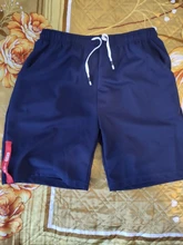 Pantalones cortos blancos de poliéster de estilo japonés para hombre, pantalones deportivos para correr, informales, con cintura elástica, sólido, ropa estampada de verano