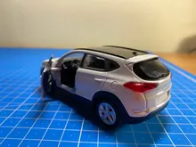 Modelo de coche de aleación para niños, escala 1:36, gran imitación, Hyundai Tucson, modelo de metal fundido a presión, regalo para niños, Envío Gratis