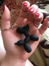 Nuevo creativo de dibujos animados globo de Llavero perro colgante anillo de hombres y mujeres par bolsa de llavero colgante venta al por mayor