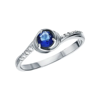

Silver ring with cubic zirconia and Sapphire synthetic sunlight sample 925