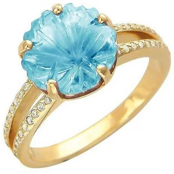 

Esthete ring with Topaz and cubic zirconia in Yellow Gold