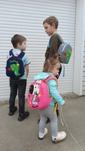 Mochila de grado alto para bebés y niñas, morral escolar 3D antipérdida con dibujos animados para guardería, impermeable de dinosaurios